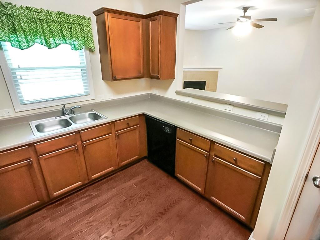 206 Madison Avenue Acworth, GA 30102 - Photo 12 of 39 a kitchen with granite countertop cabinets stainless steel appliances a sink and a window