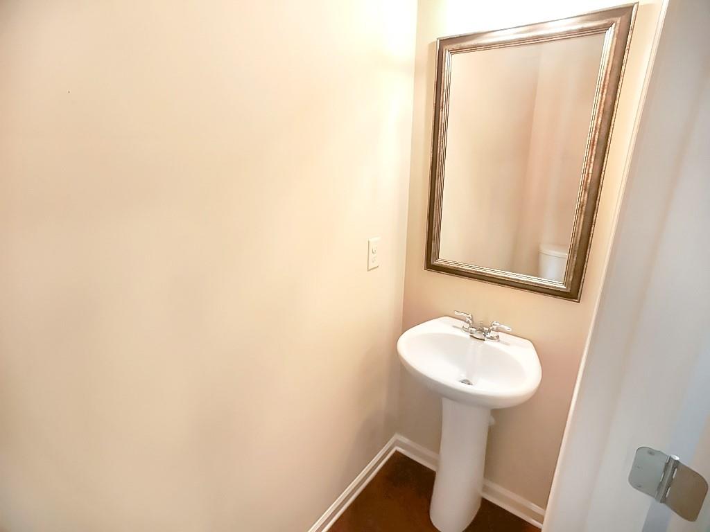 206 Madison Avenue Acworth, GA 30102 - Photo 16 of 39 a bathroom with a sink and a mirror