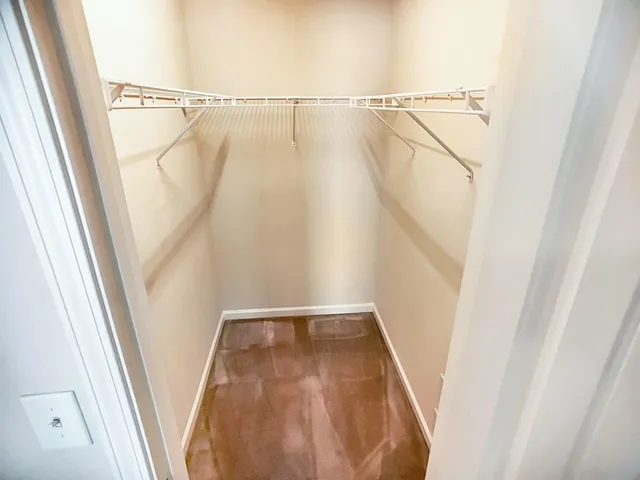 a bathroom with a tub and shower