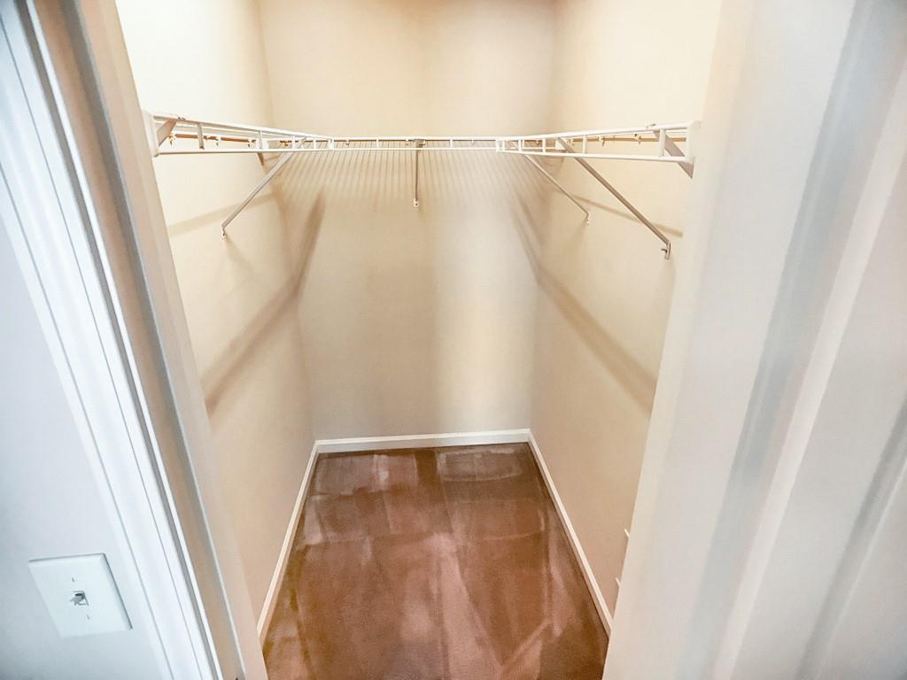 206 Madison Avenue Acworth, GA 30102 - Photo 24 of 39 a view of walk in closet with empty door