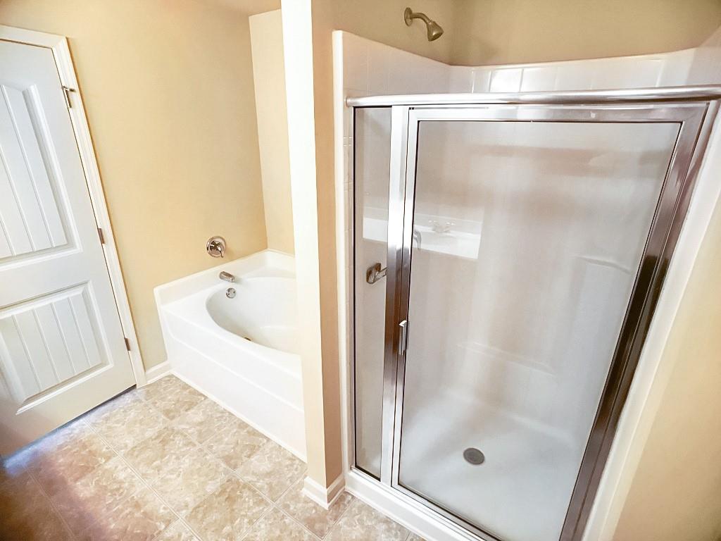 206 Madison Avenue Acworth, GA 30102 - Photo 27 of 39 a bathroom with a tub and shower