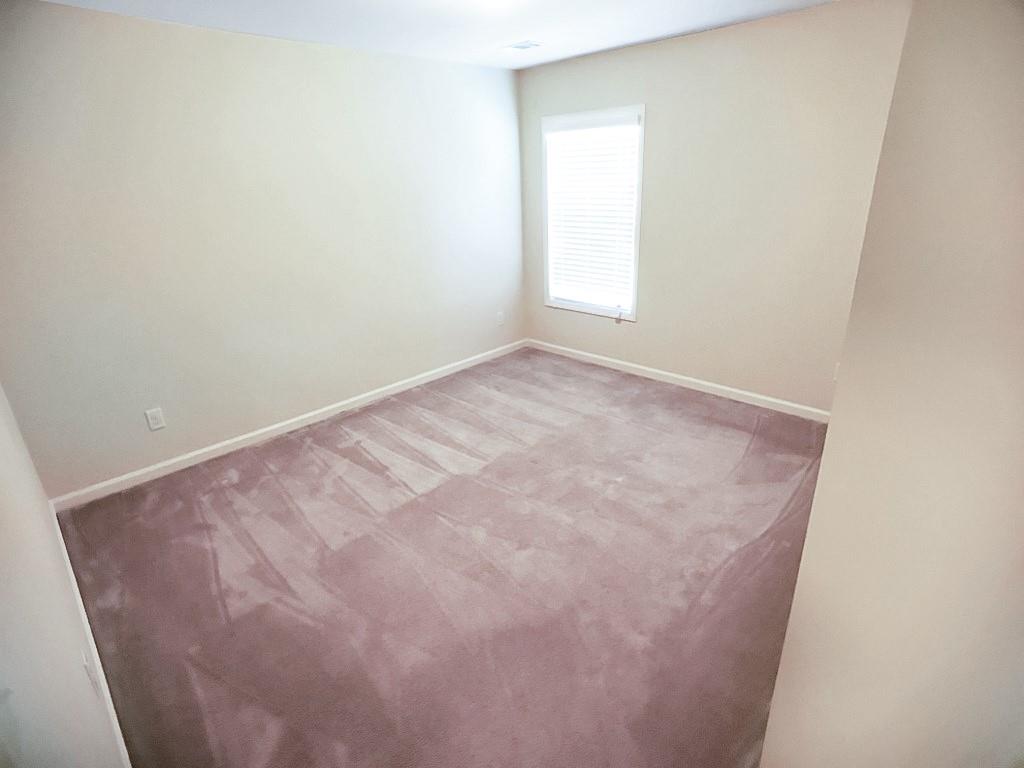 206 Madison Avenue Acworth, GA 30102 - Photo 31 of 39 an empty room with a window