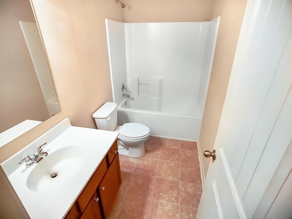 206 Madison Avenue Acworth, GA 30102 - Photo 33 of 39 a bathroom with a sink a toilet and shower
