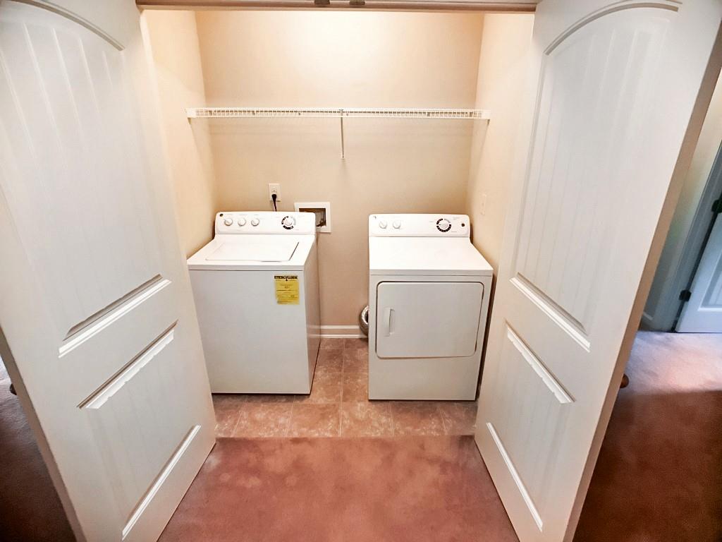 206 Madison Avenue Acworth, GA 30102 - Photo 34 of 39 a utility room with dryer and washer