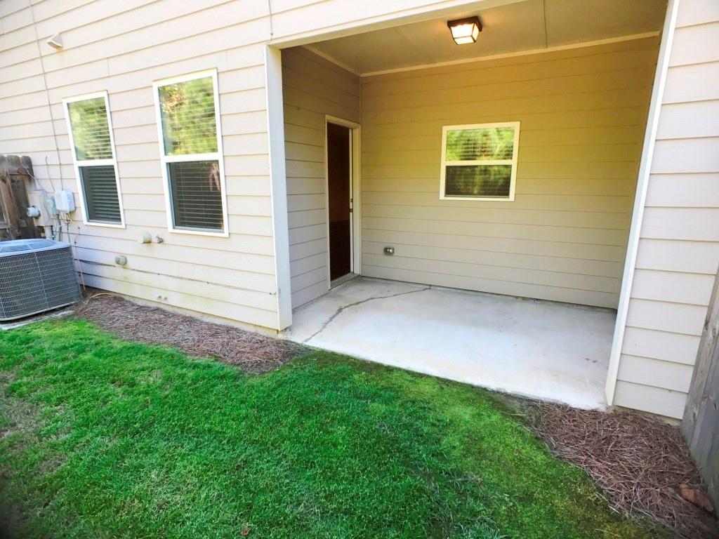 206 Madison Avenue Acworth, GA 30102 - Photo 38 of 39 a view of an house with backyard and a window
