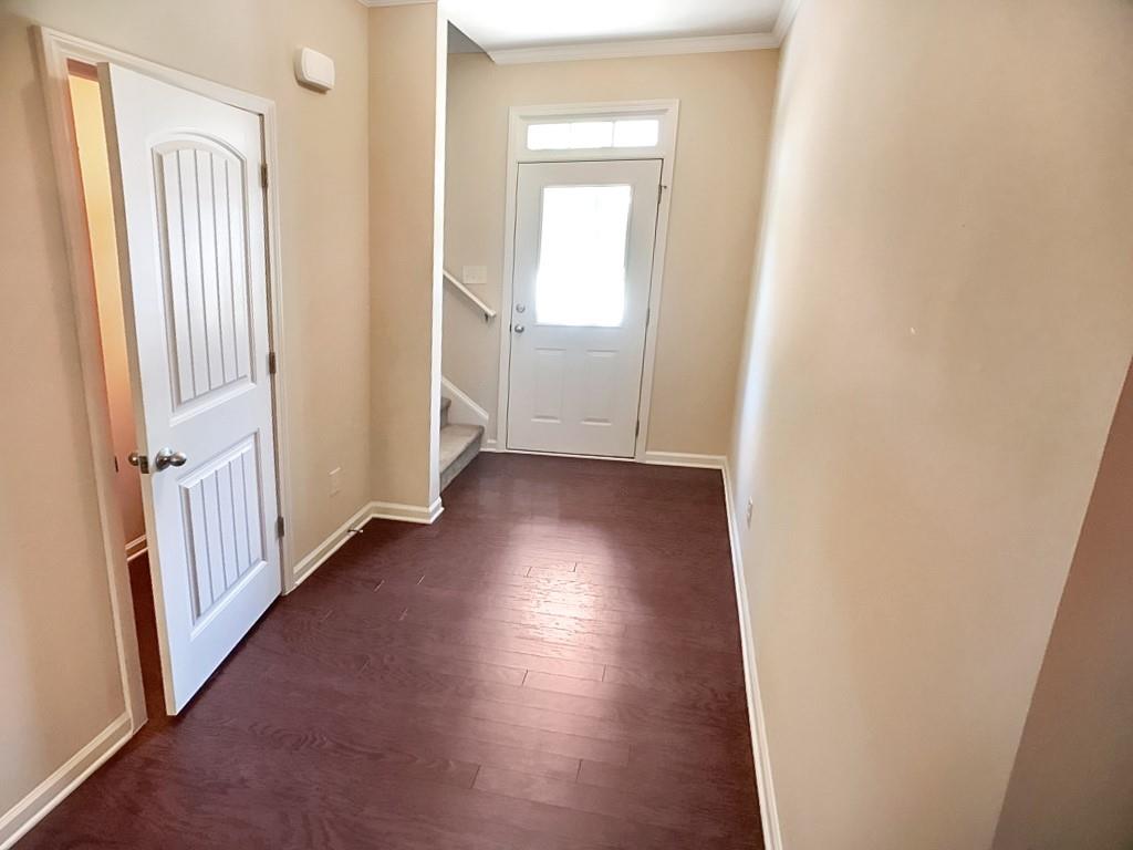 206 Madison Avenue Acworth, GA 30102 - Photo 4 of 39 a view of a hallway with wooden floor