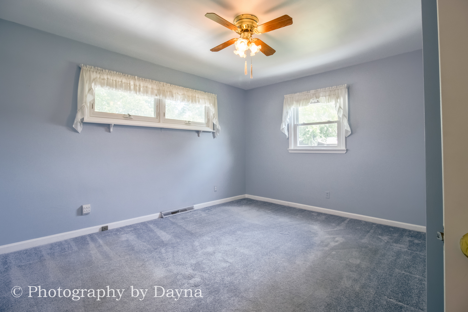 6 Park Place Kankakee, IL 60901 - Photo 16 of 36 an empty room with windows and fan