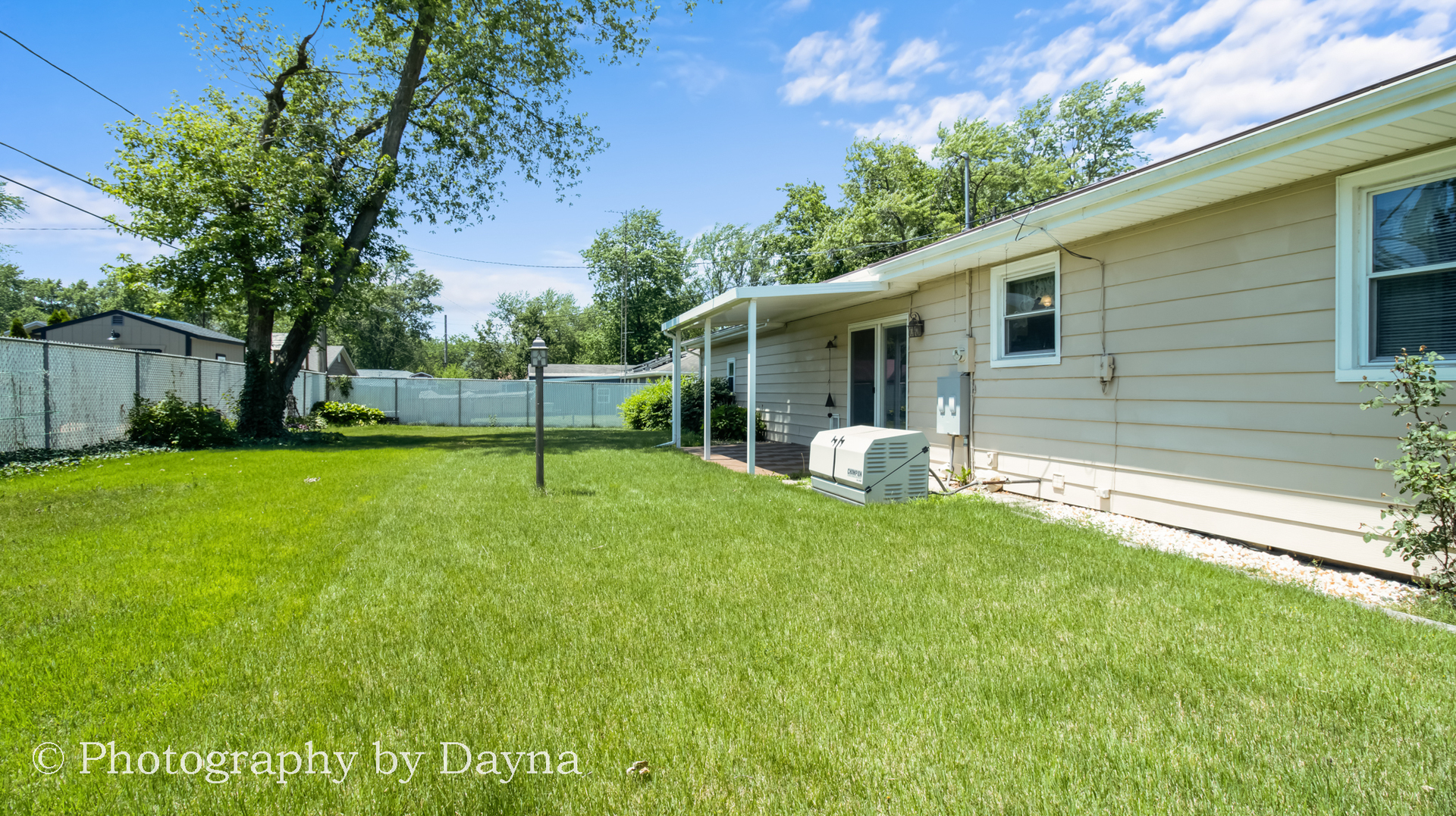 6 Park Place Kankakee, IL 60901 - Photo 34 of 36 a view of a house with a backyard
