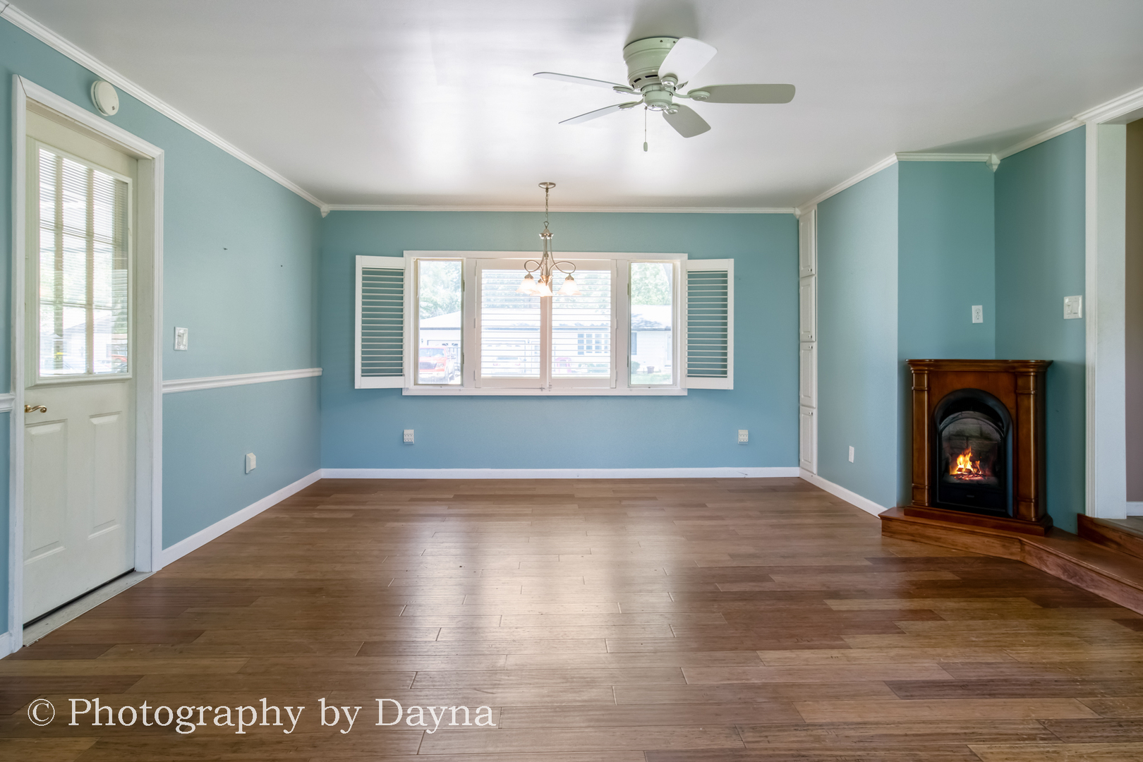 6 Park Place Kankakee, IL 60901 - Photo 9 of 36 a view of empty room with wooden floor and fan