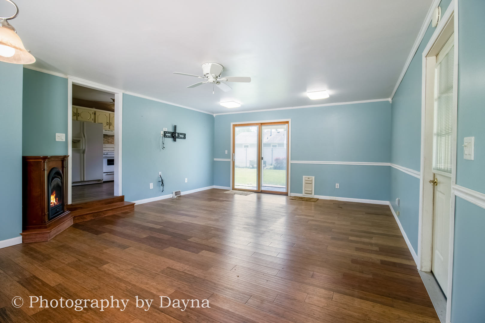 6 Park Place Kankakee, IL 60901 - Photo 10 of 36 a view of an empty room with window and wooden floor
