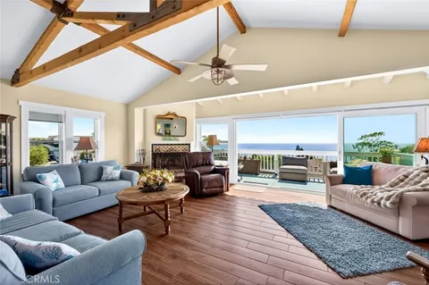 a view of a balcony with furniture