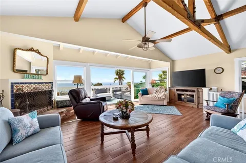 a kitchen with stainless steel appliances a stove a microwave and a refrigerator