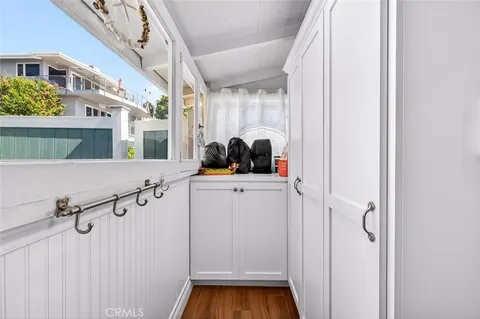 a bathroom with a sink mirror and vanity