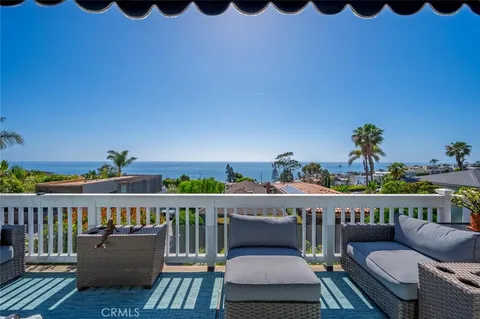 a view of balcony with furniture