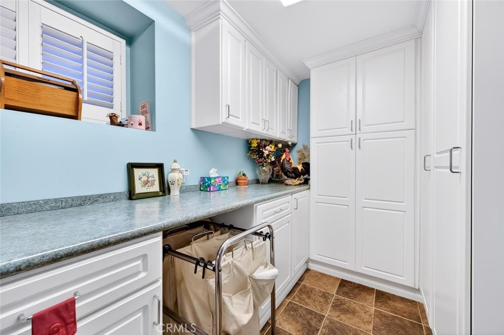2896 Terry Road Laguna Beach, CA 92651 - Photo 47 of 74 Laundry room with ample storage.