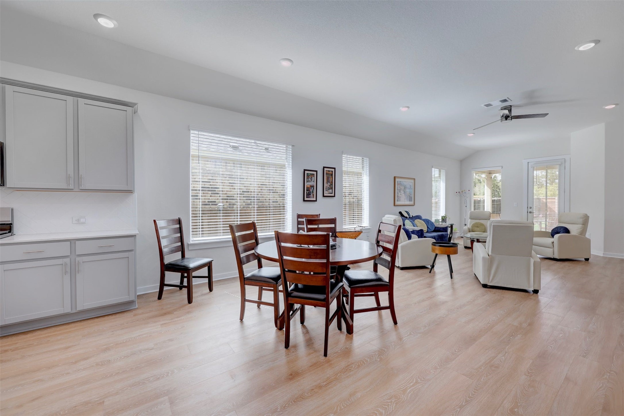 2041 Centerline Lane Georgetown, TX 78628 - Photo 11 of 31 a view of a dining room with furniture and wooden floor