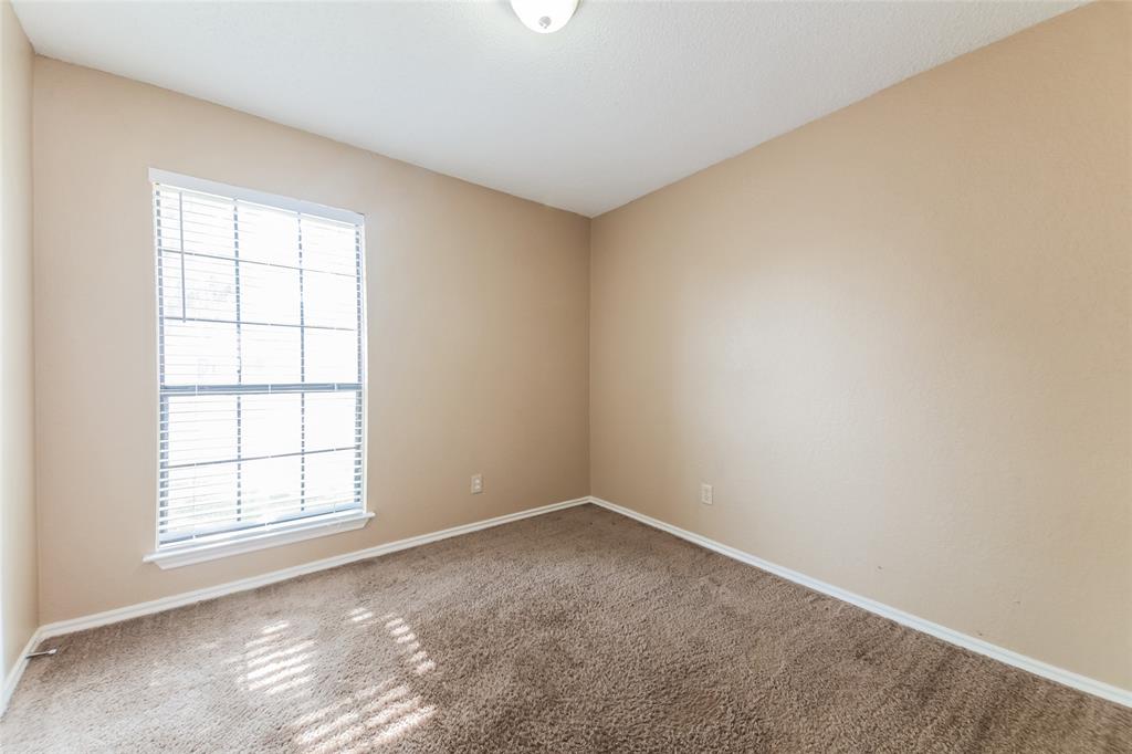 2313 Crestview Lane Rowlett, TX 75088 - Photo 12 of 16 an empty room with a window