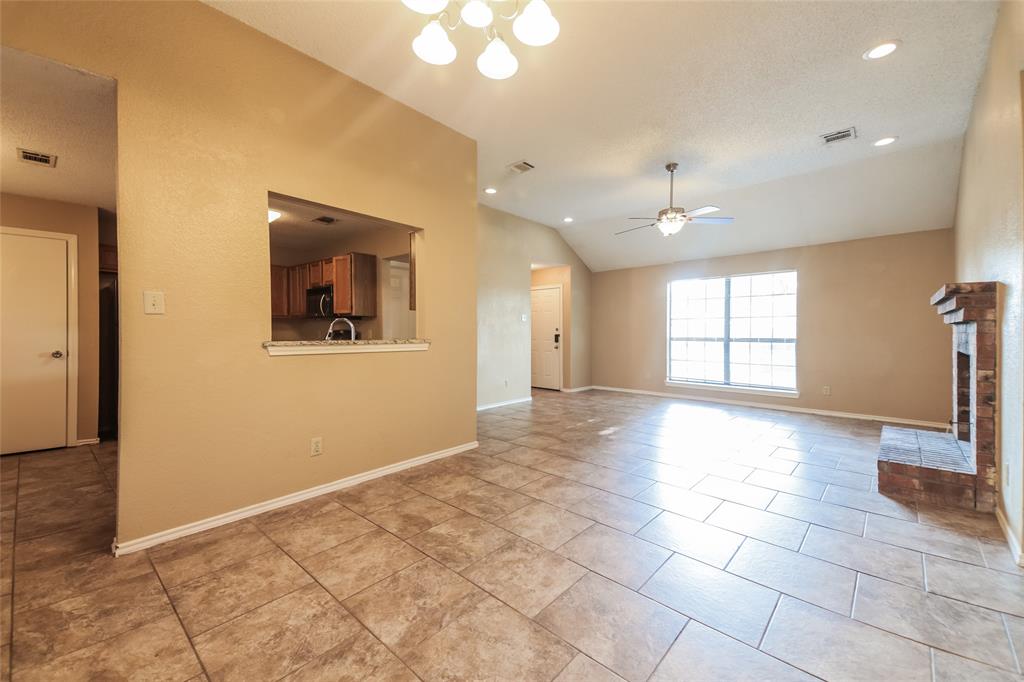 2313 Crestview Lane Rowlett, TX 75088 - Photo 5 of 16 a view of an empty room with a window