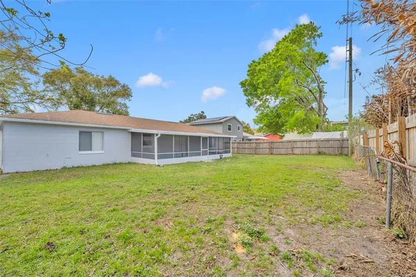 a view of backyard with green space