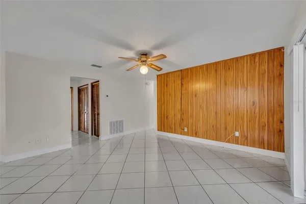 a kitchen with stainless steel appliances granite countertop a refrigerator and a stove