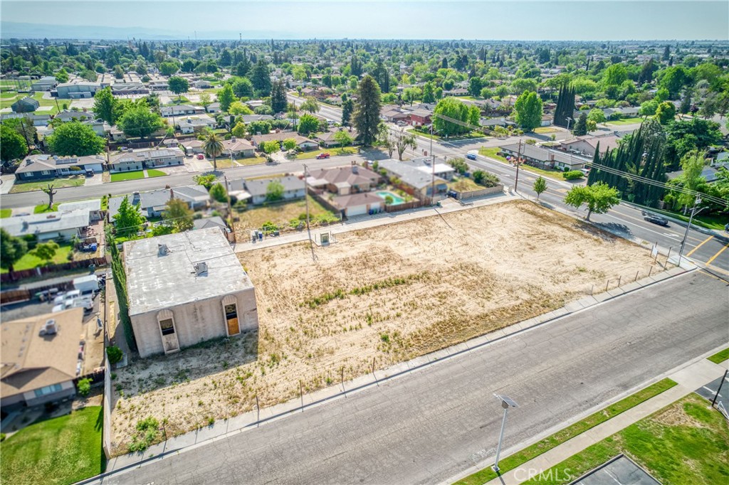 1803 Sunset Avenue Madera, CA 93637 - Photo 5 of 19 an aerial view of residential houses with outdoor space