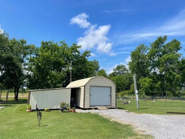 a view of backyard with green space