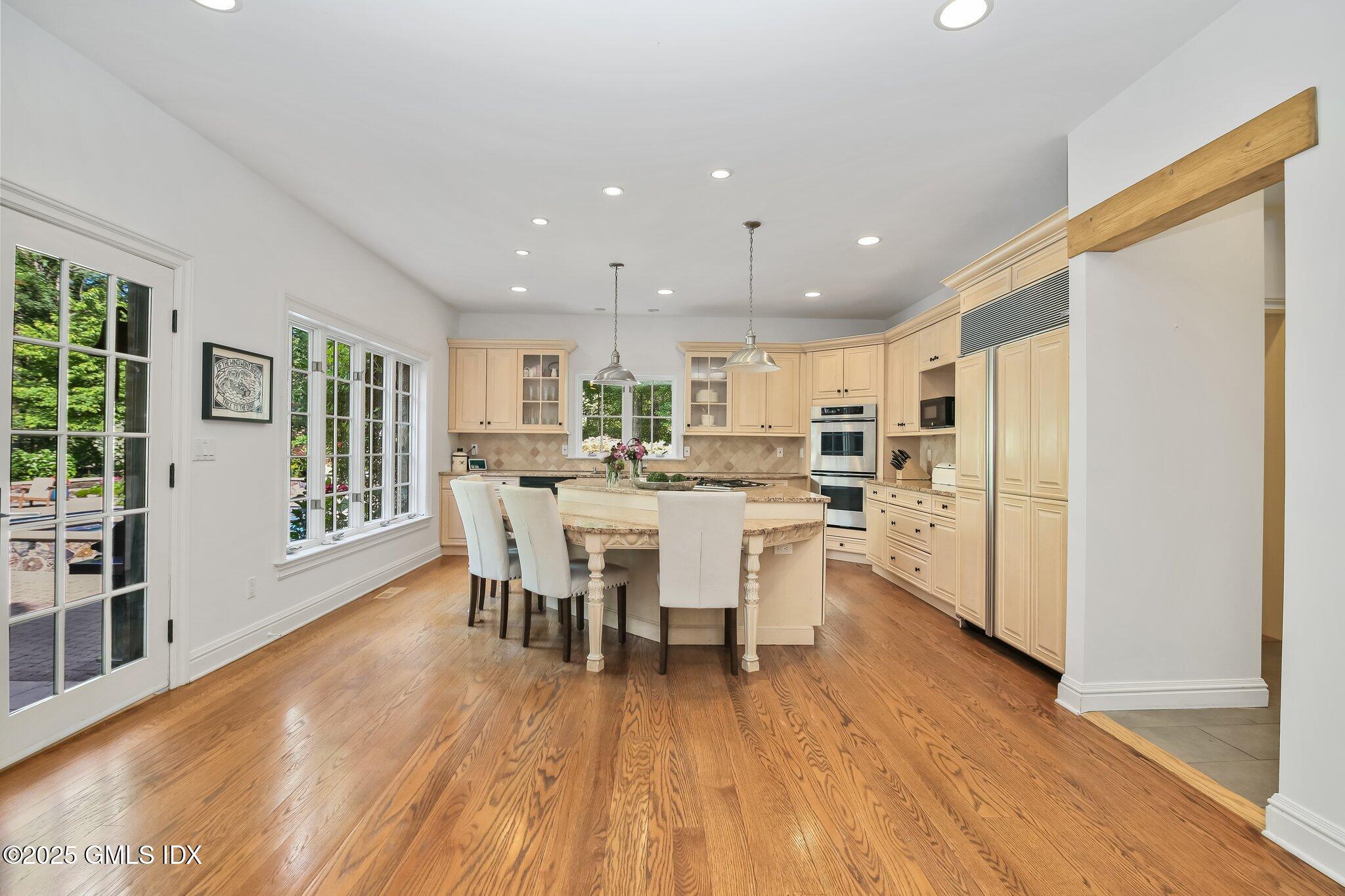 3090 High Ridge Road Stamford, CT 06903 - Photo 12 of 40 a dining room with furniture and wooden floor