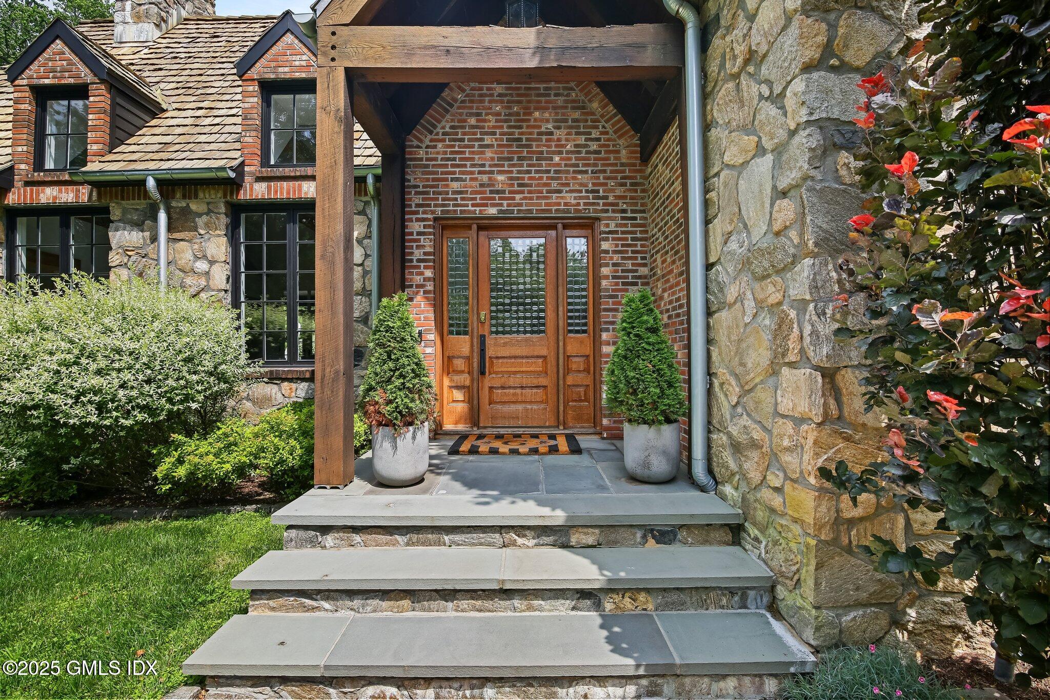 3090 High Ridge Road Stamford, CT 06903 - Photo 2 of 40 a front view of a house with garden