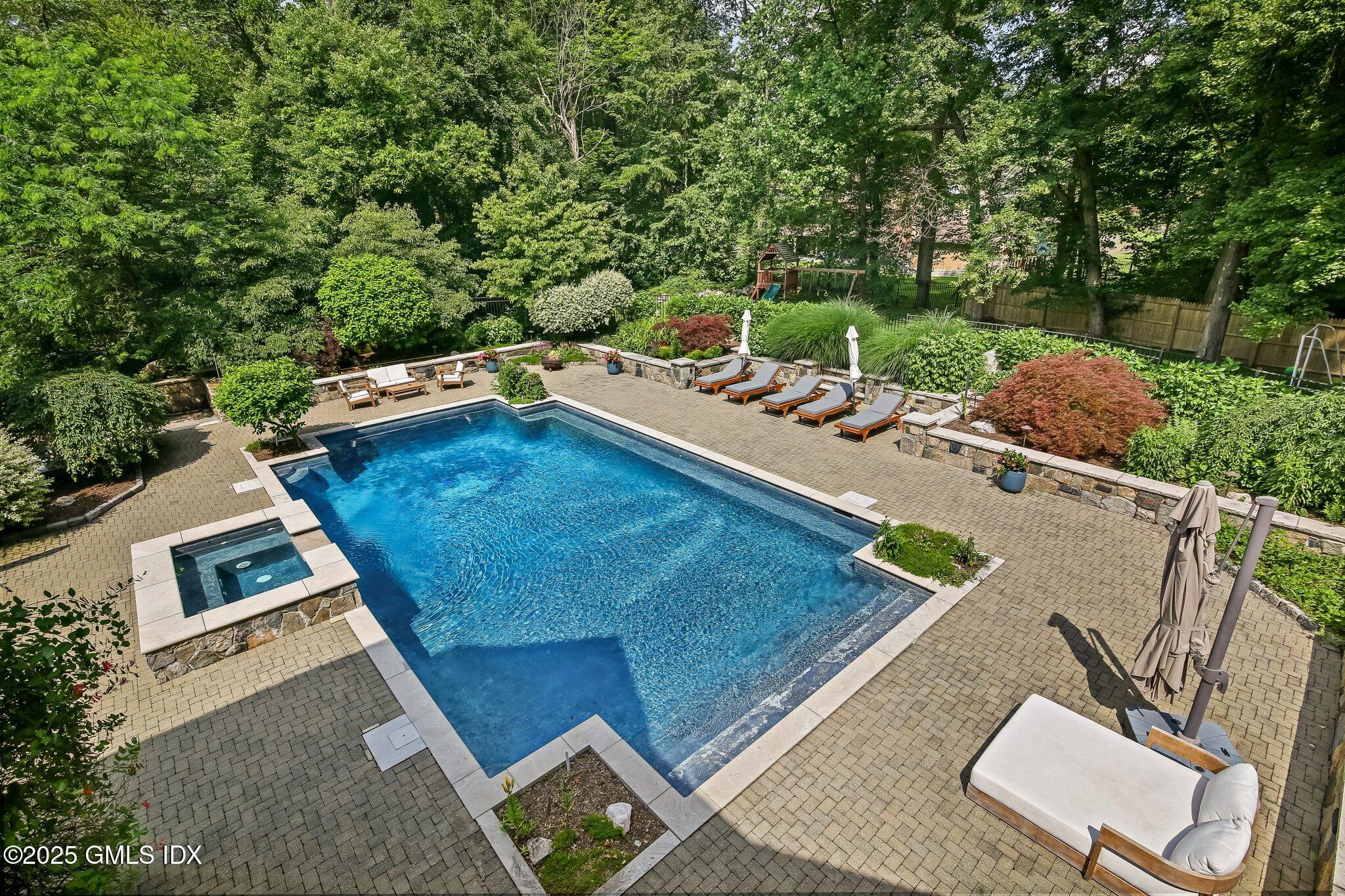 3090 High Ridge Road Stamford, CT 06903 - Photo 31 of 40 a view of a backyard with sitting area