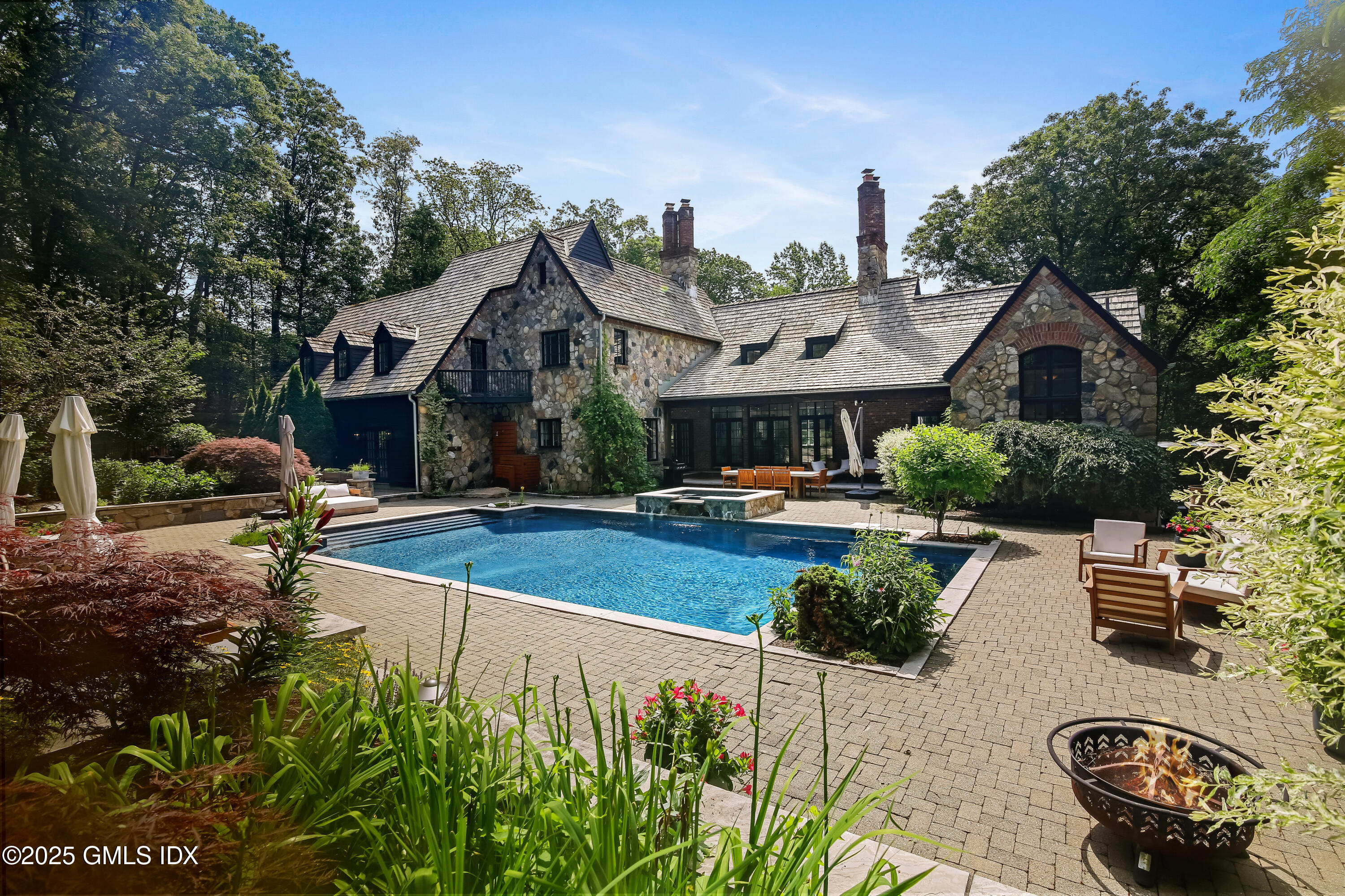 3090 High Ridge Road Stamford, CT 06903 - Photo 33 of 40 a front view of a house with garden