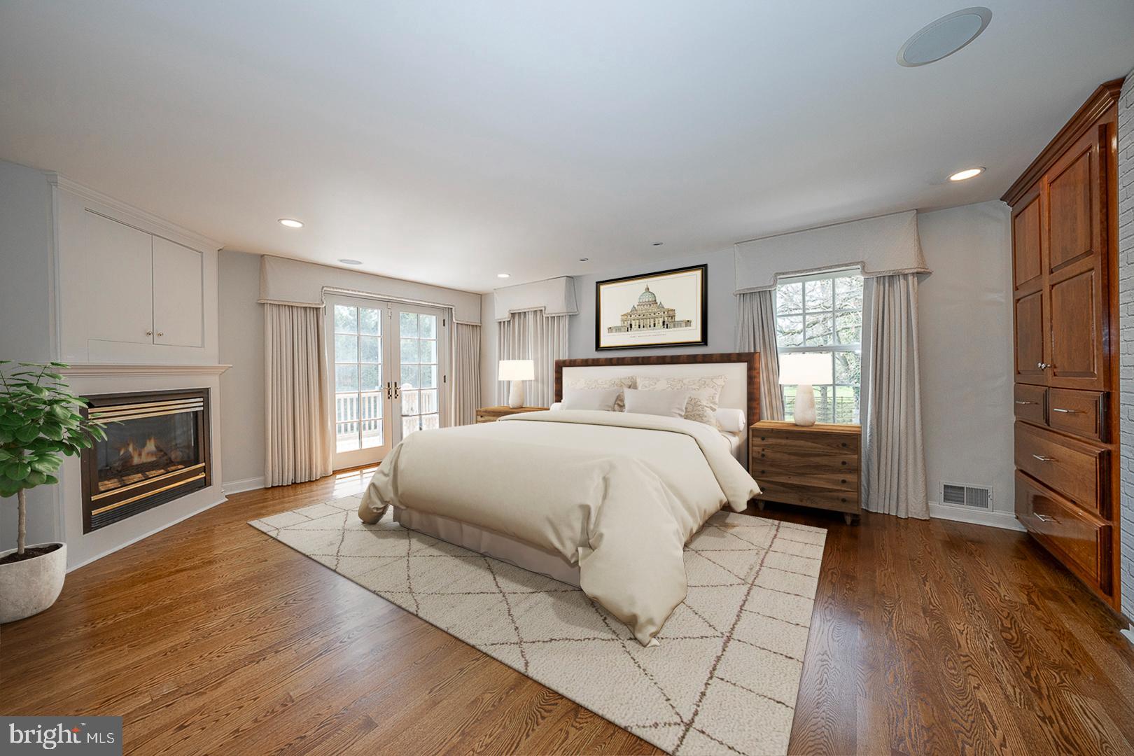 1416 Old Gulph Road Villanova, PA 19085 - Photo 13 of 41 a bedroom with a bed and a flat screen tv
