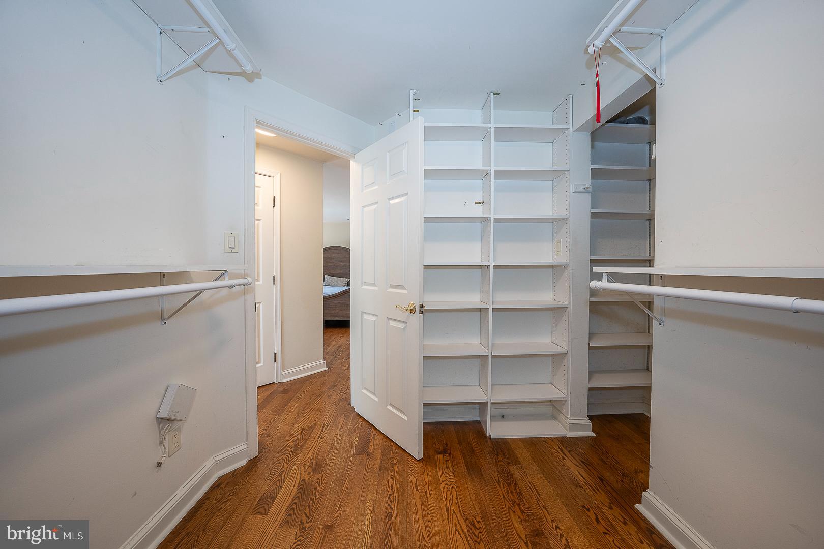 1416 Old Gulph Road Villanova, PA 19085 - Photo 14 of 41 a room with walk in closet and wooden floor