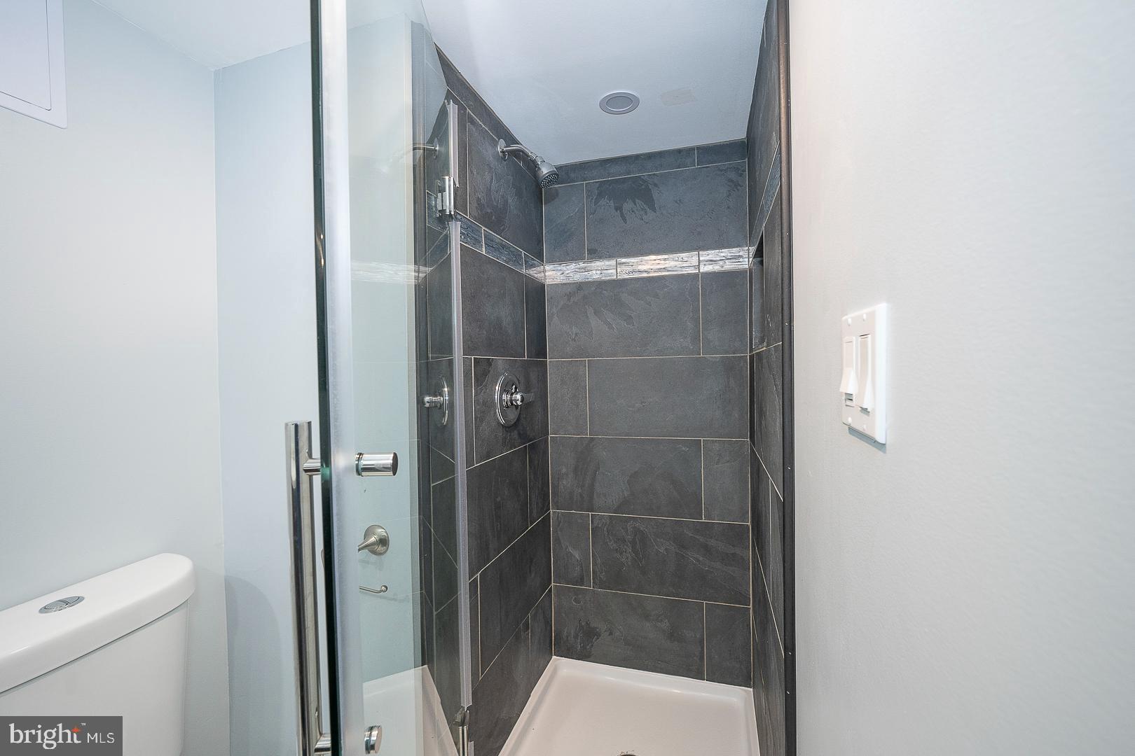 1416 Old Gulph Road Villanova, PA 19085 - Photo 29 of 41 a bathroom with a shower and toilet