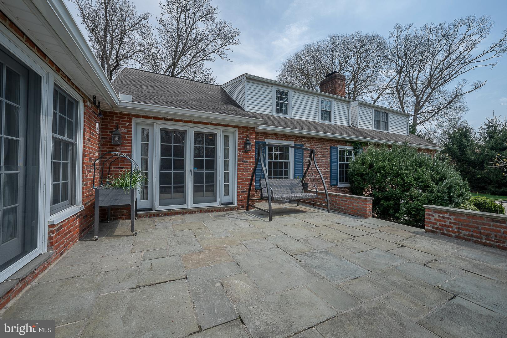 1416 Old Gulph Road Villanova, PA 19085 - Photo 30 of 41 a view of a house with backyard porch and sitting area