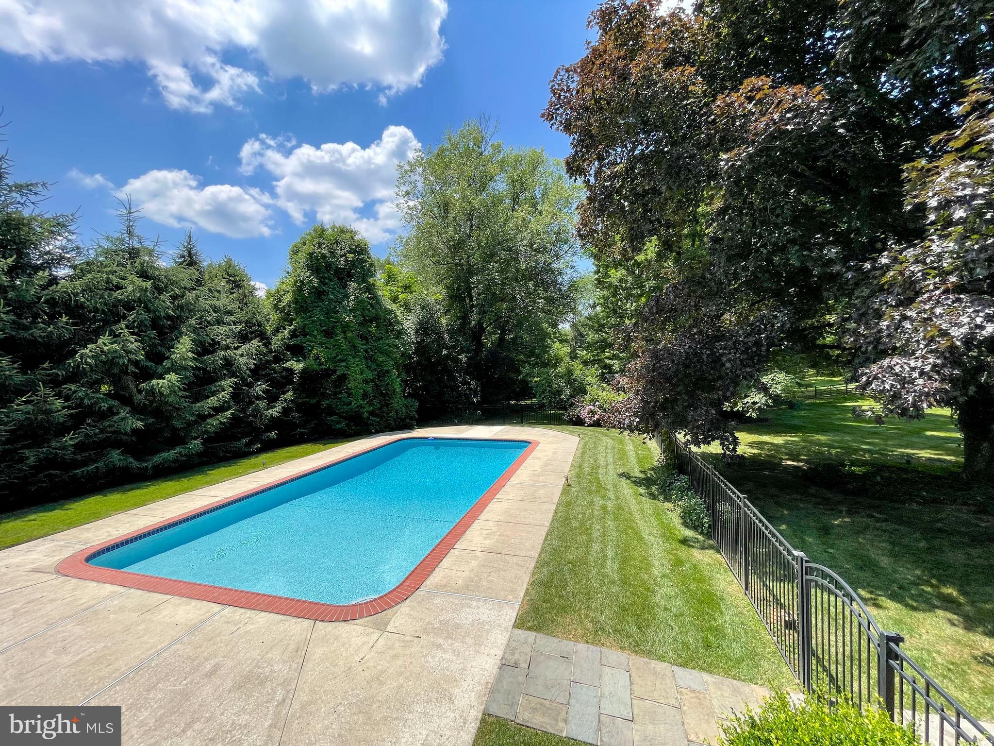 1416 Old Gulph Road Villanova, PA 19085 - Photo 33 of 41 a view of swimming pool with a yard