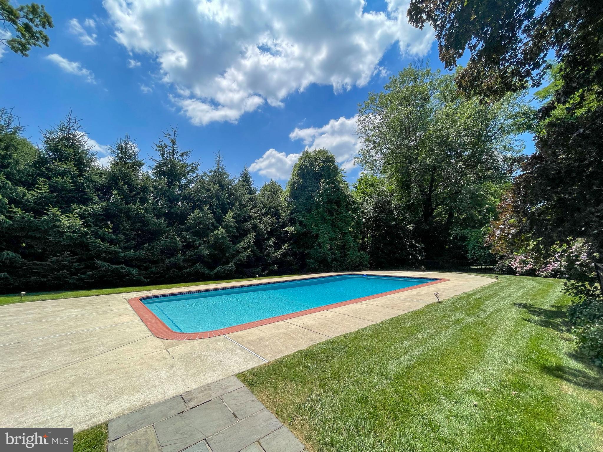 1416 Old Gulph Road Villanova, PA 19085 - Photo 34 of 41 a view of swimming pool with an outdoor space and seating area