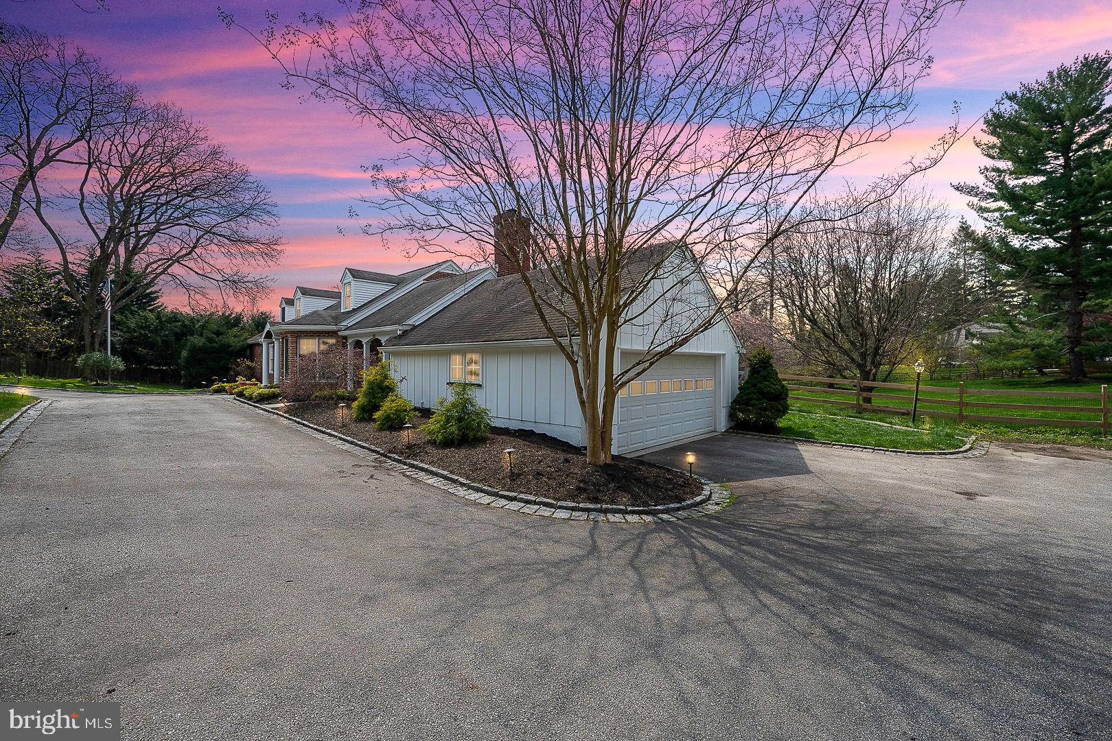 1416 Old Gulph Road Villanova, PA 19085 - Photo 39 of 41 a view of a house with a yard and garage
