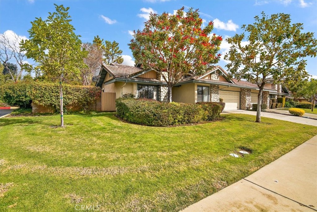 1263 Citrus Street Upland, CA 91784 - Photo 12 of 16 a front view of a house with a yard