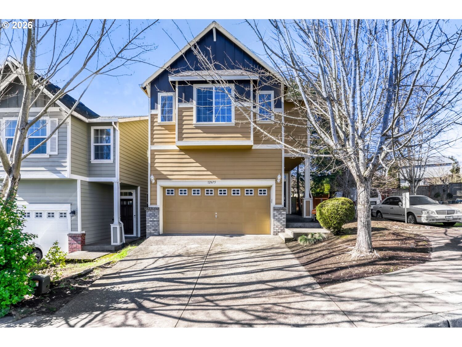 12675 Southwest 158th Terrace Beaverton, OR 97007 - Photo 1 of 26 a front view of a house with a yard