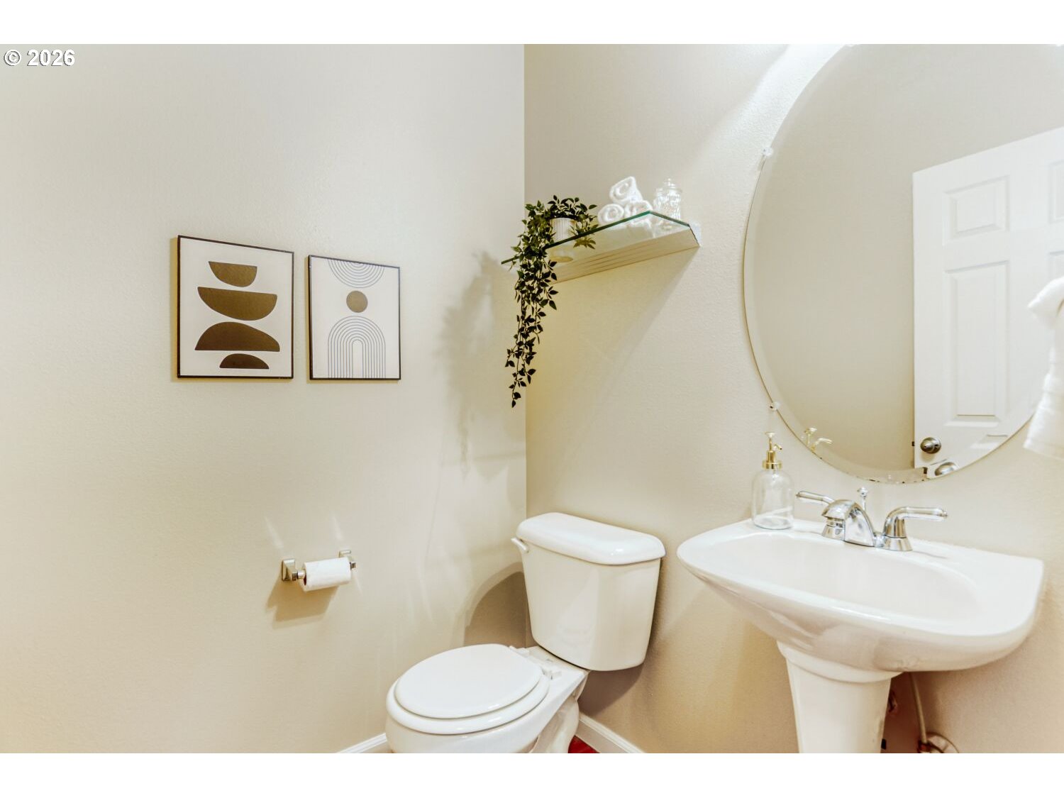 12675 Southwest 158th Terrace Beaverton, OR 97007 - Photo 12 of 26 a bathroom with a sink mirror and toilet