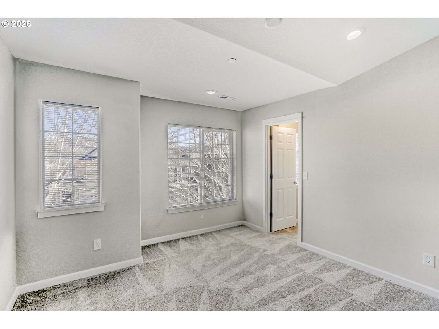 12675 Southwest 158th Terrace Beaverton, OR 97007 - Photo 18 of 26 an empty room with windows and closet