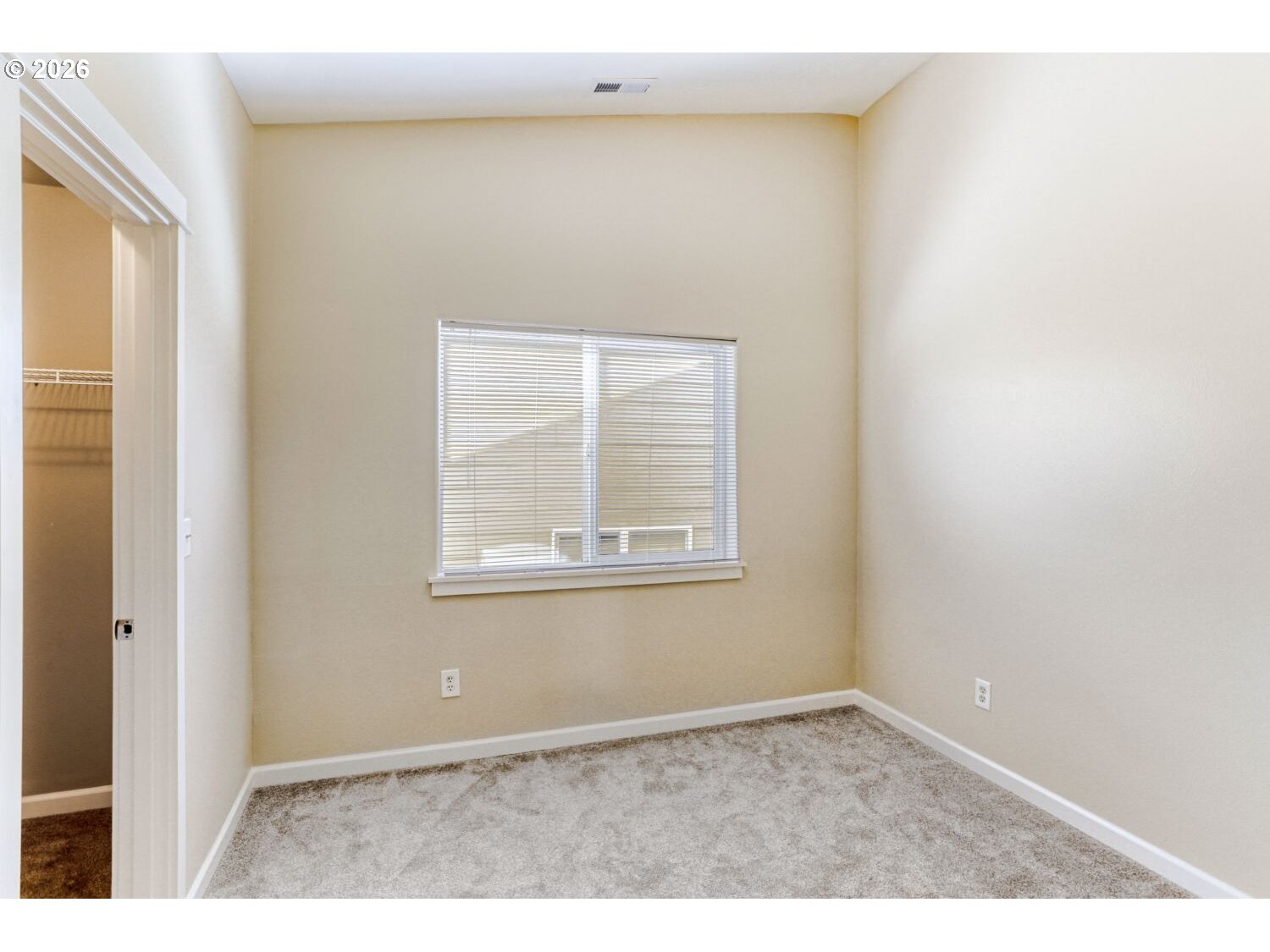12675 Southwest 158th Terrace Beaverton, OR 97007 - Photo 19 of 26 a view of an empty room with a window