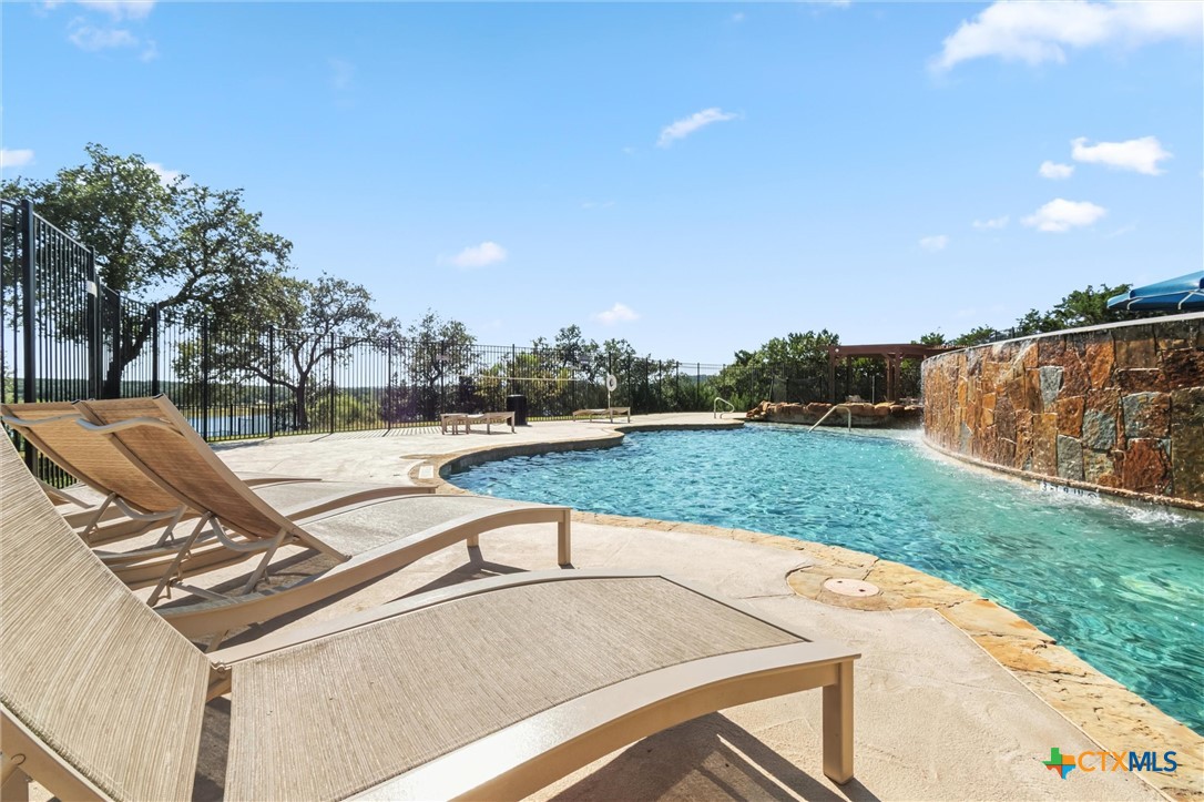 8424 Red Bottle Brush Road Lago Vista, TX 78645 - Photo 7 of 47 community infinity pool