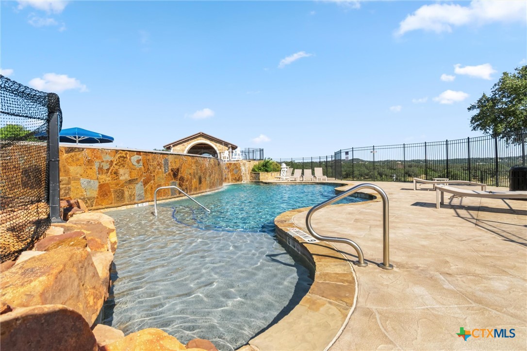 8424 Red Bottle Brush Road Lago Vista, TX 78645 - Photo 8 of 47 community infinity pool