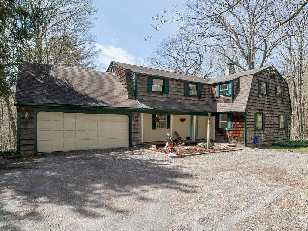 248 Wright Road Canton, CT 06019 - Photo 1 of 1 a view of a house with a yard and garage