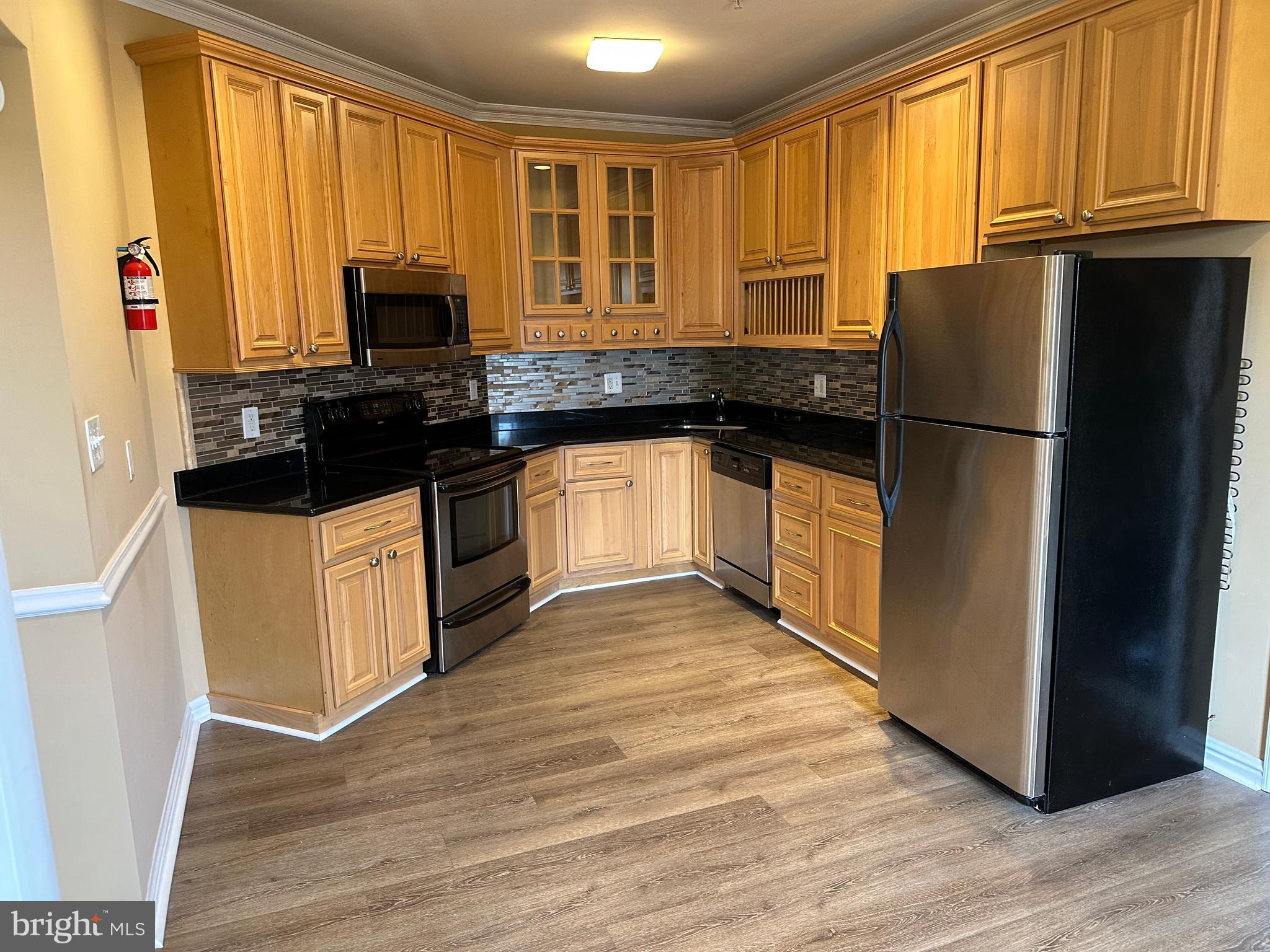 5045 C Street Southeast, Unit 302 Washington, DC 20019 - Photo 11 of 25 Kitchen view from dining area.