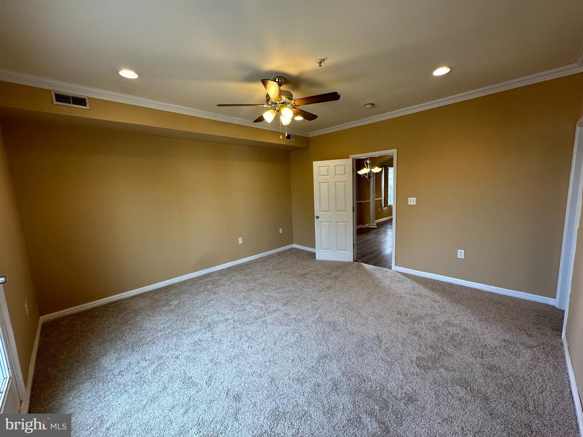 5045 C Street Southeast, Unit 302 Washington, DC 20019 - Photo 15 of 25 Main bedroom with walk out balcony.
