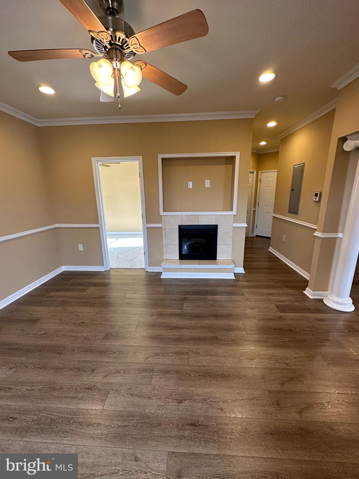 5045 C Street Southeast, Unit 302 Washington, DC 20019 - Photo 3 of 25 Main living area with fireplace.