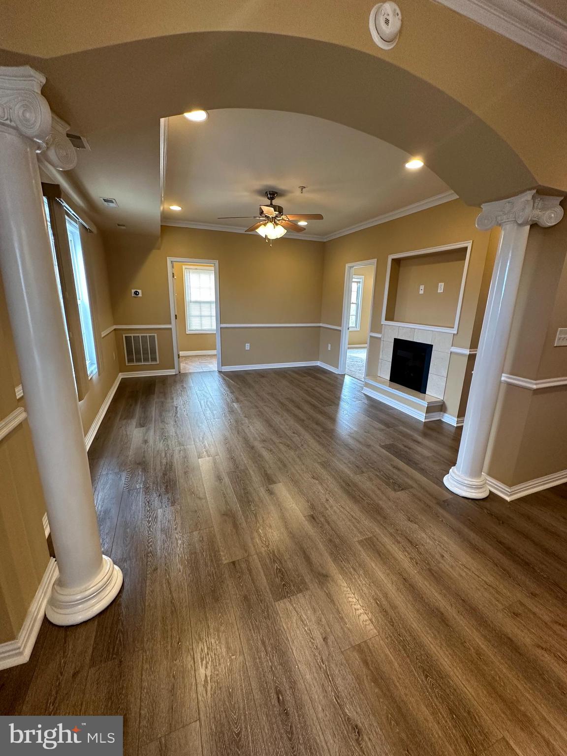 5045 C Street Southeast, Unit 302 Washington, DC 20019 - Photo 4 of 25 Main living area with fireplace.