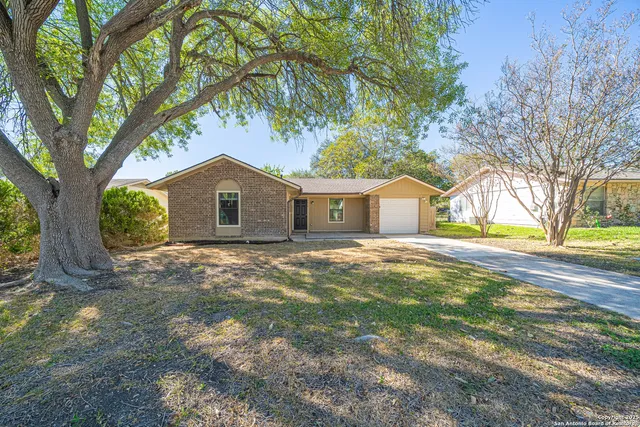 a house with trees in front of it
